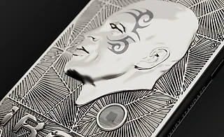 Caviar создал титановый iPhone 11 Pro c частицей экипировки Майка Тайсона