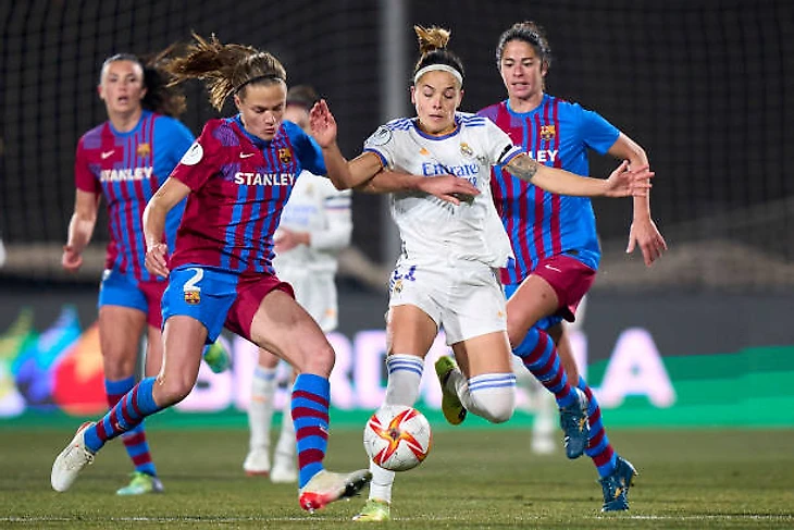 Irene Paredes of FC Barcelona women battle for the ball with Claudia Zornoza of Real Madrid women during the Supercopa de Espana women Semi Final...