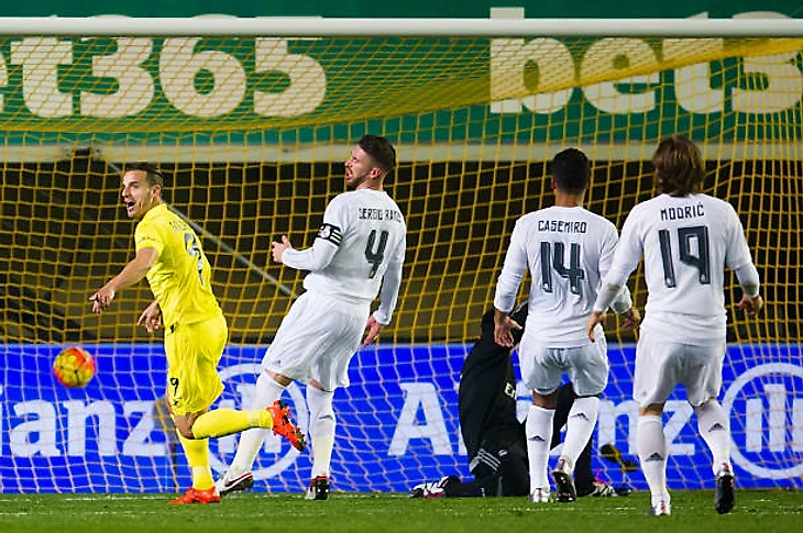 Roberto Soldado of Villarreal CF celebrates after scoring the opening goal during the La Liga match between Villarreal CF and Real Madrid CF at El...