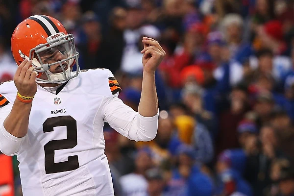 ORCHARD PARK, NY - NOVEMBER 30: Johnny Manziel #2 of the Cleveland Browns celebrates a touchdown against the Buffalo Bills during the second half at Ralph Wilson Stadium on November 30, 2014 in Orchard Park, New York. (Photo by Tom Szczerbowski/Getty Images)