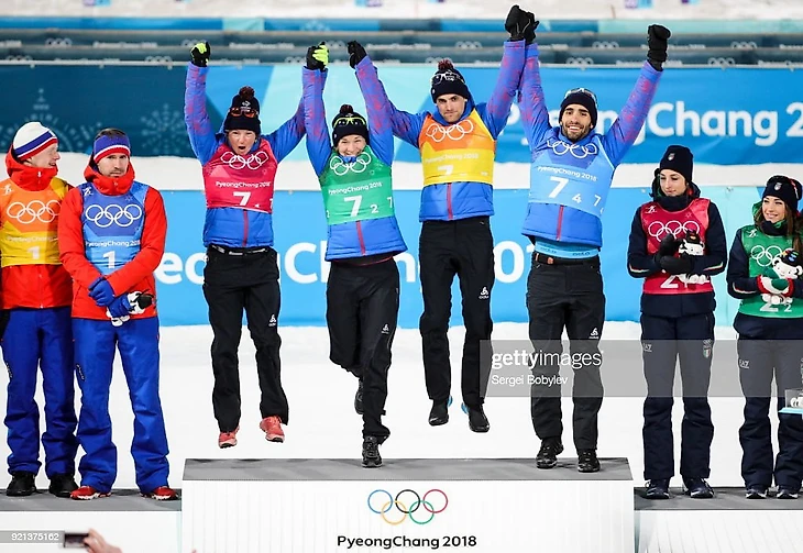 Marie Dorin Habert,Anais Bescond ,Simon Desthieux and Martin Fourcade of France, Gold, celebrates on the podium after the Biathlon Mixed Relay during day eleven of the 2018 Winter Olympics on February 20, 2018 in Pyeongchang.