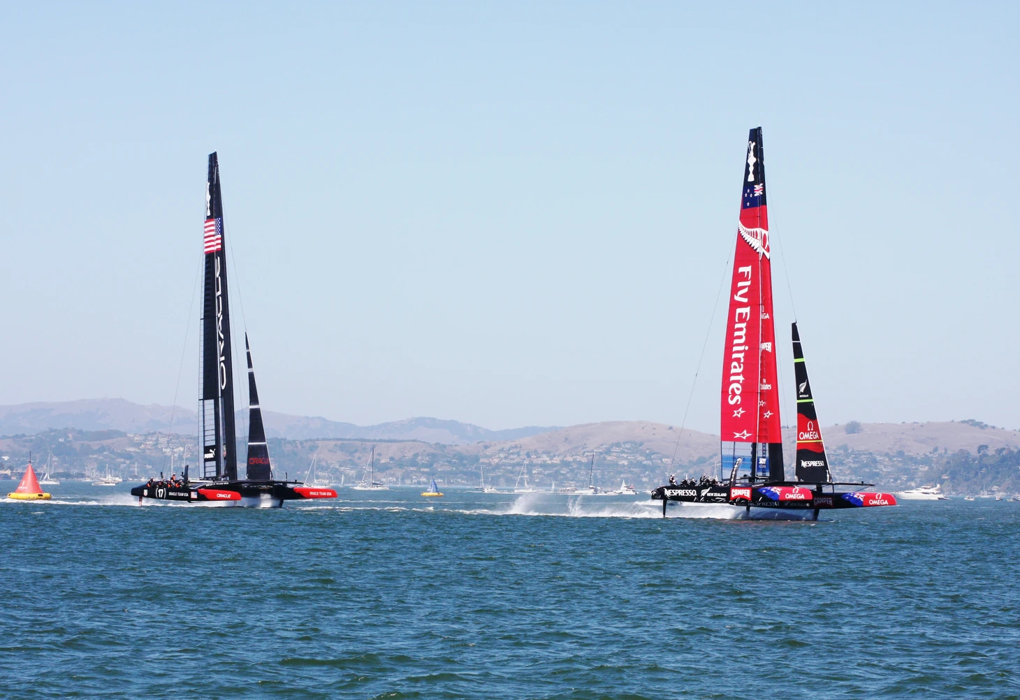 &quout;File:2013 America's Cup, race 1, mark 1.JPG&quout; by Donan.raven is licensed under CC BY-SA 3.0