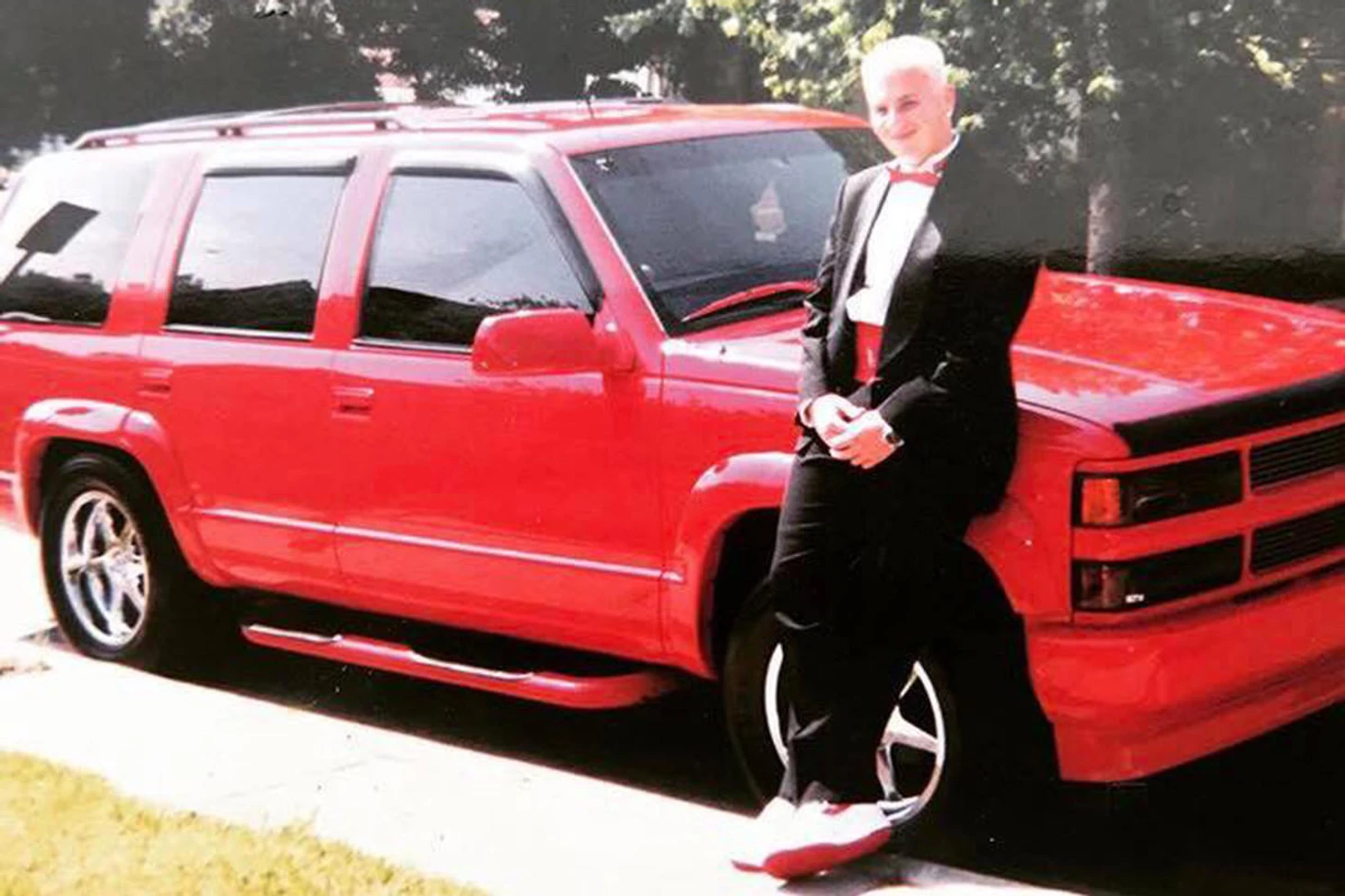 Ian Rice with Lorenzen Wright's custom Chevrolet Tahoe