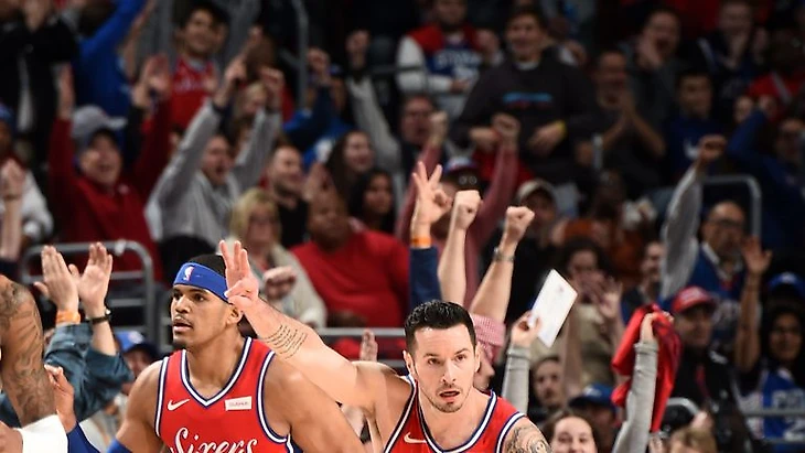 JJ Redick salutes the Philadelphia crowd after draining a three-pointer