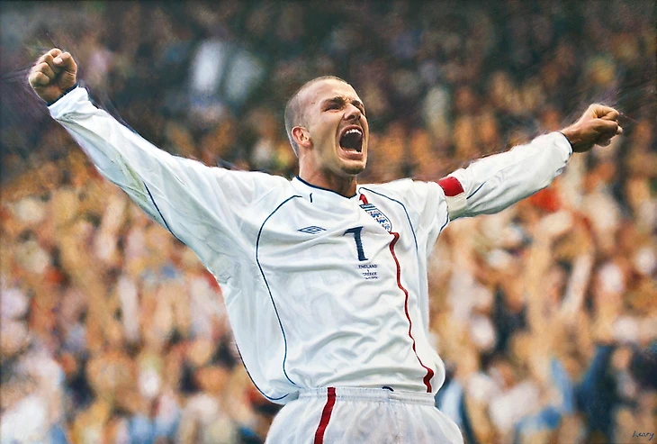 Дэвид Бекхэм празднует гол в ворота Греции в 2000