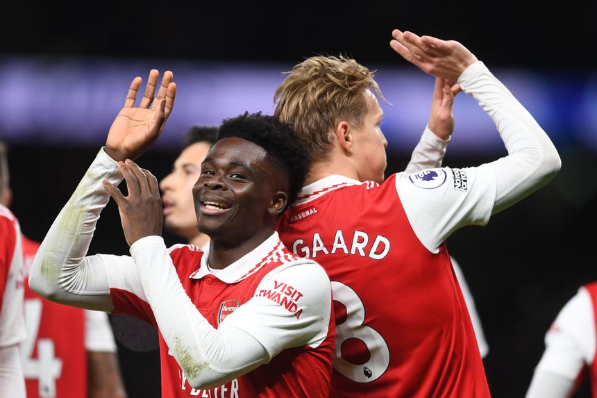 Arsenal go eight points clear with historic derby win