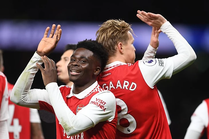 Arsenal go eight points clear with historic derby win