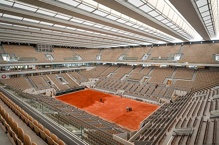 Red clay being put on the new Philippe-Chatrier court September 2020
