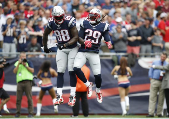 Sep 18, 2016; Foxborough, MA, USA; New England Patriots tight end Martellus Bennett (88) and running back LeGarrette Blount (29) celebrate after scoring a touchdown against the Miami Dolphins during the first quarter at Gillette Stadium. Mandatory Credit: Greg M. Cooper-USA TODAY Sports