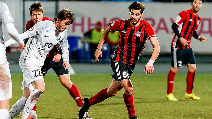 16 октября. Пермь. &quout;Амкар&quout; - &quout;Тосно&quout; - 0:0. Резиуан МИРЗОВ (№22) и Саид ЭЗЗАТОЛЛАХИ (№66). Фото ФК &quout;Тосно&quout;