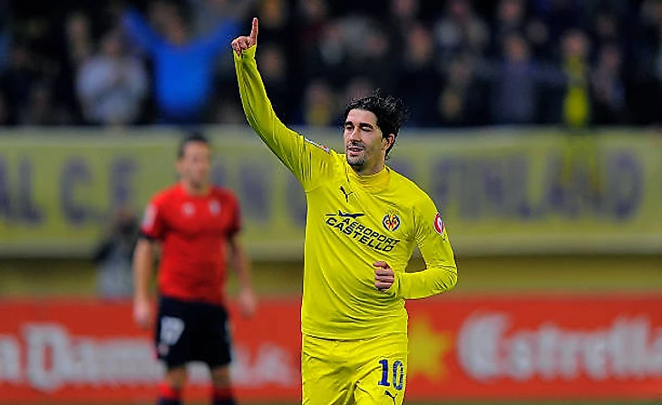 Villarreal's midfielder Cani celebrates his goal during the Spanish league football match Villarreal CF vs Club Atletico Osasuna on January 15, 2011...