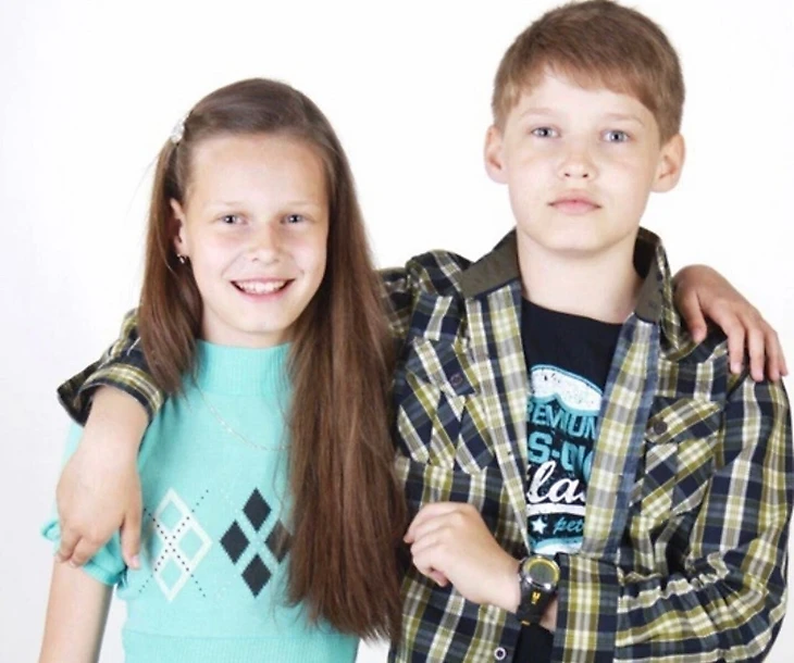 С братом Евгением в детстве