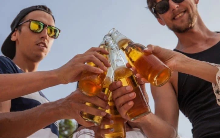 Should You Drink Beer After Running? Here's The Optimal Amount