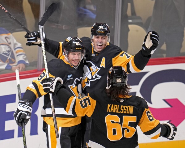 Crosby, Malkin lead Penguins past Sabres 6-5 in OT to cap milestone night | AP News