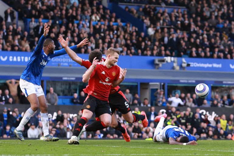 Man Utd survive late VAR penalty drama to fightback for draw at Everton | Football News | Al Jazeera