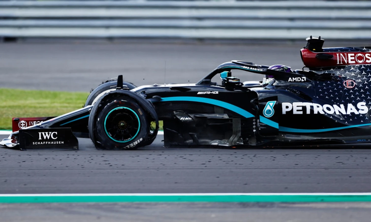 Lewis Hamilton hangs on to win British Grand Prix after puncture drama | British Grand Prix | The Guardian