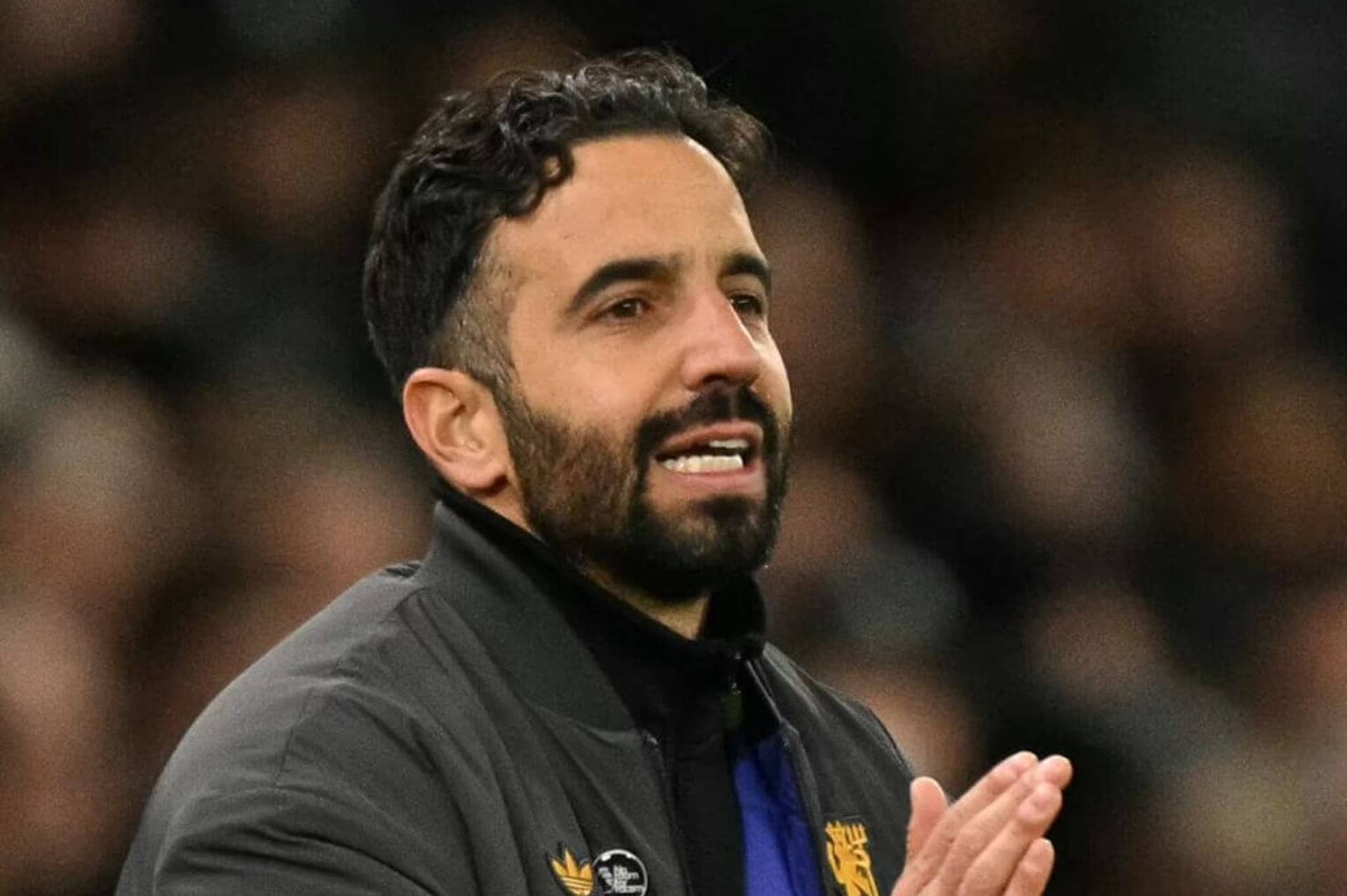 Ruben Amorim claps his players during a game at Old Trafford