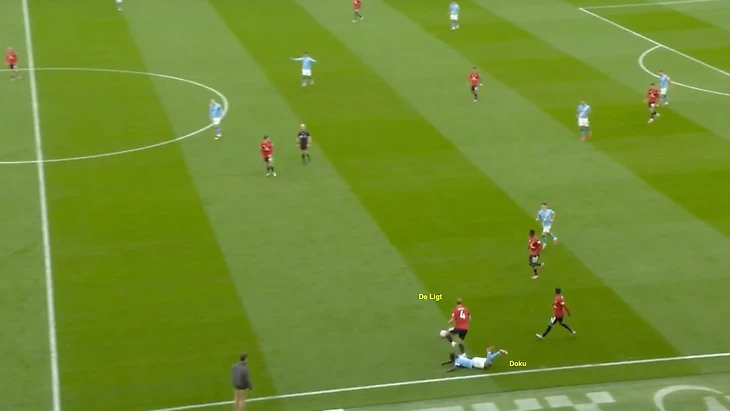 De ligt winning the ball back from doku