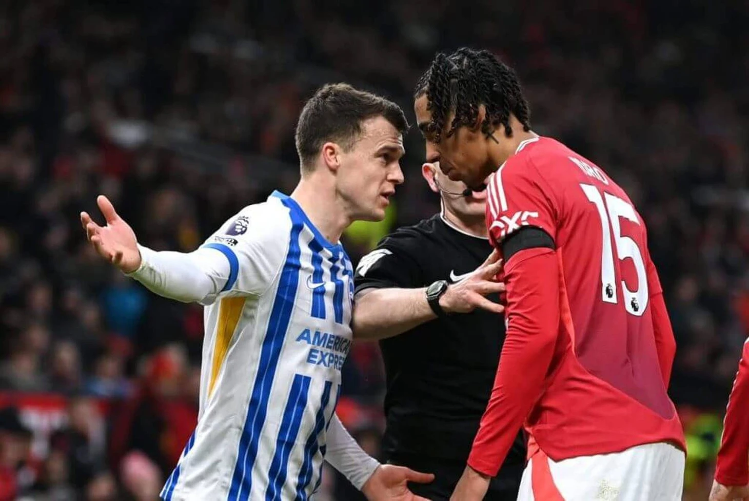 Solly March confronts Leny Yoro