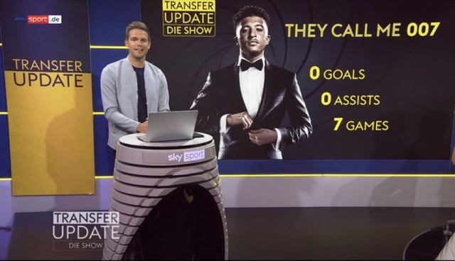 Sky Germany] Picture of Sky Germany on their Transfer Update Show, as they taunt Jadon Sancho, showing him in a suit as James Bond: "They call me 007: 0 goals, 0 assists,