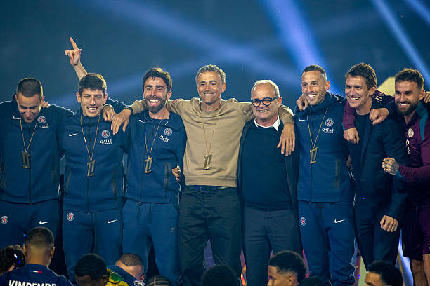Head coach Luis Enrique with football advisor Luís Campos and his coach staff during the champions trophy presentation after the Paris Saint-Germain...