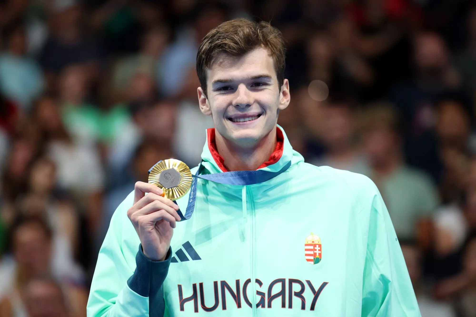 Men's Swimming's Kos claims gold in 200 back at Paris Olympics - University of Texas Athletics